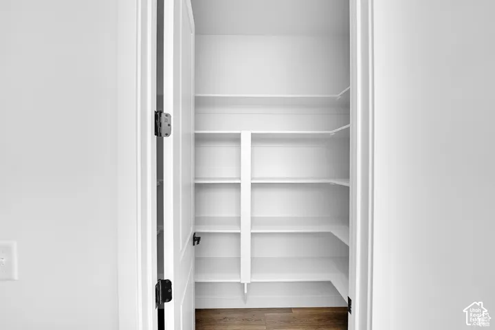 Built-in shelving with wood-finish flooring