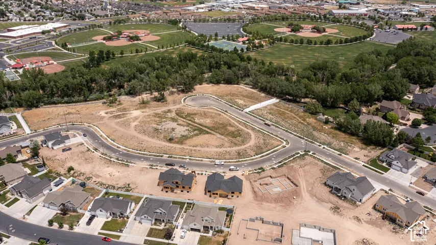 Aerial perspective showcasing residential development with established homes and new construction