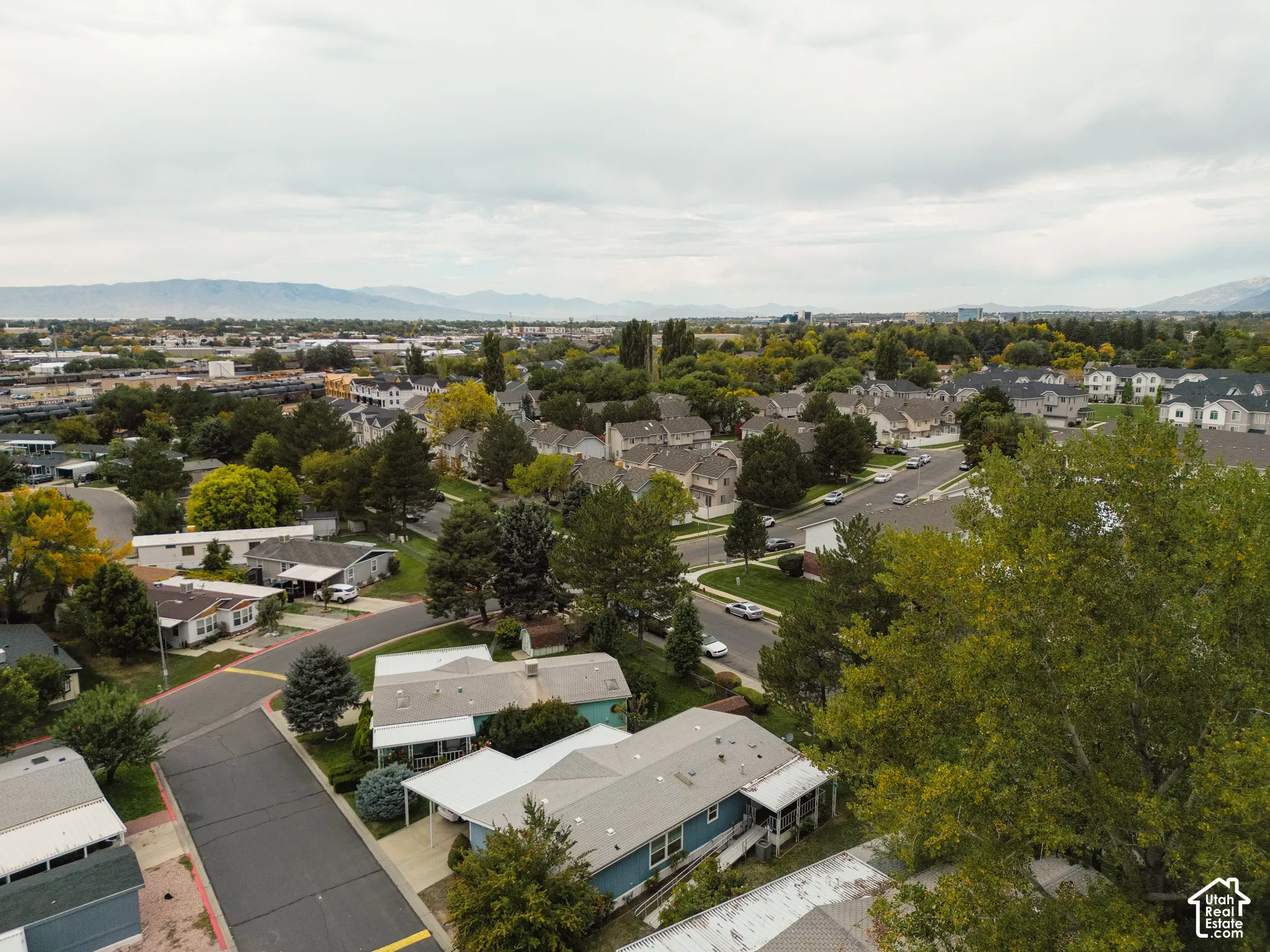 Expansive residential area featuring established homes, mature trees, and paved streets