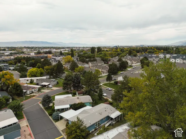 Expansive residential area featuring established homes, mature trees, and paved streets