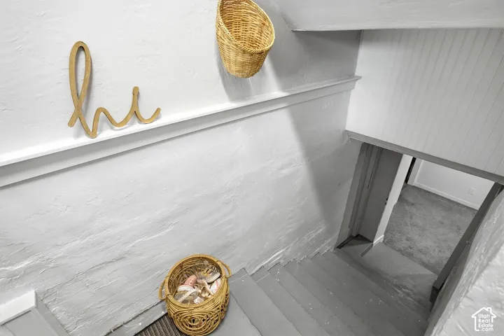 Painted staircase with textured wall finish