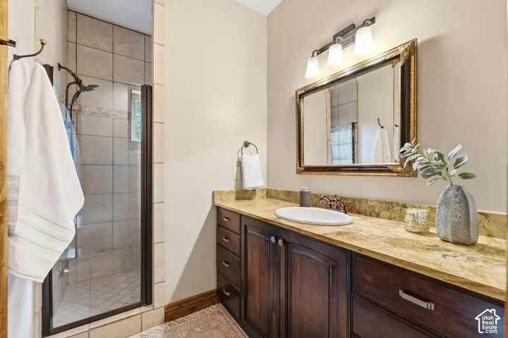 Rich wood-finish vanity with ample storage