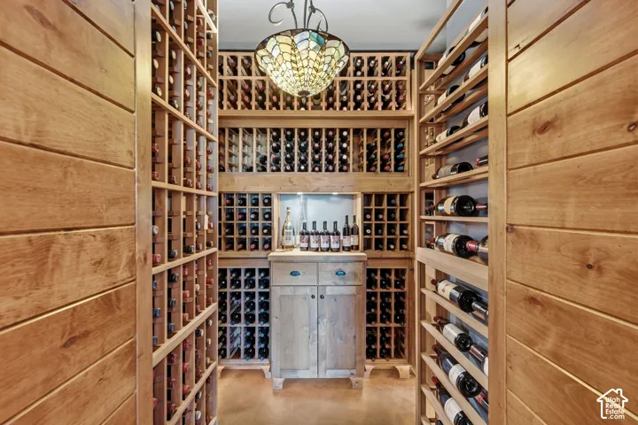 Wood-paneled walls and extensive wood wine storage racks