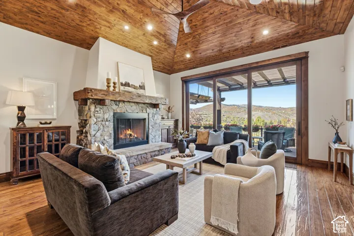 Vaulted wood-paneled ceiling with recessed lighting