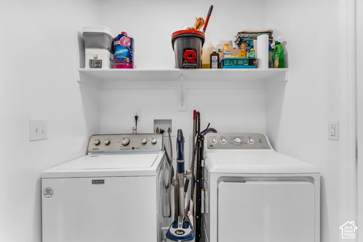 Laundry area featuring a built-in shelf and dedicated appliance hookups