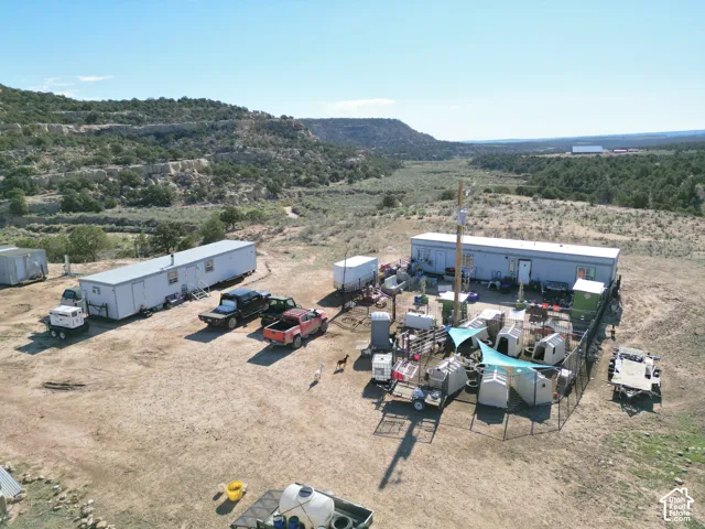 Expansive property featuring multiple outbuildings and clear skies