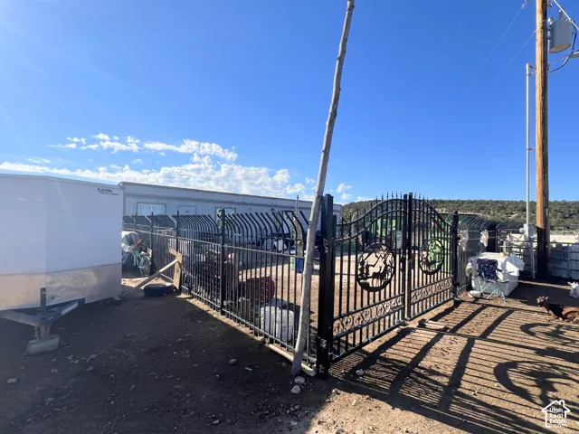 Wrought iron-style gate with decorative accents