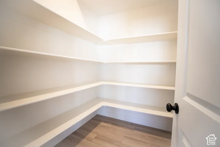 Huge walk-in pantry adjacent to kitchen.