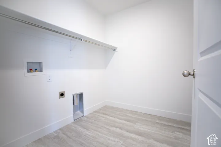 Full-size, dedicated laundry room with washer/dryer hookups.