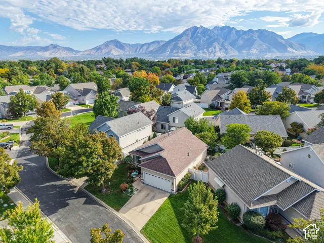 Residential neighborhood with paved streets and mature trees