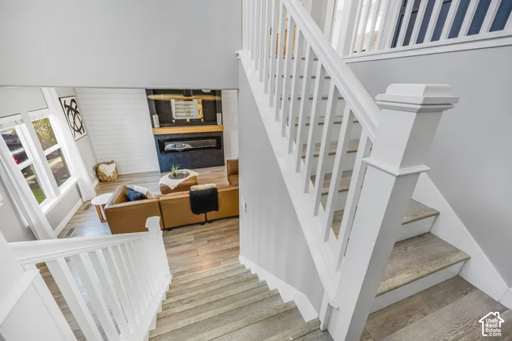 Hardwood flooring on stairs and main living area