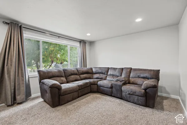Wall-to-wall carpeting and recessed ceiling lighting