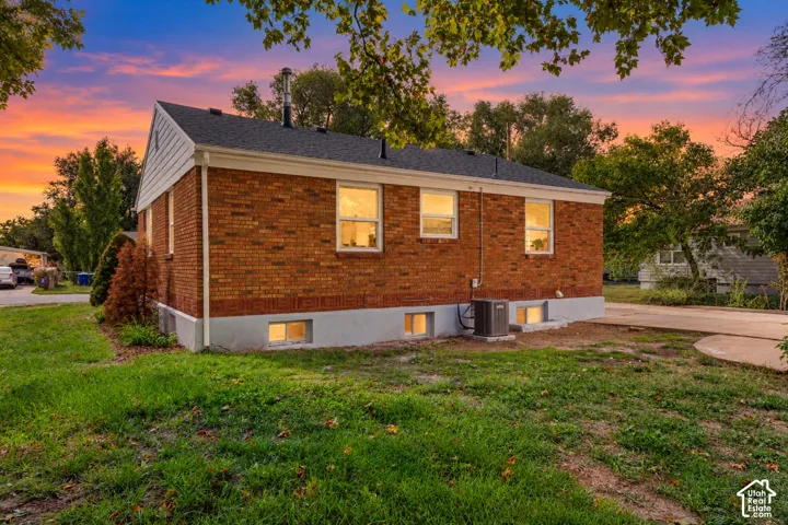Brick exterior with a gabled roof and white siding accents