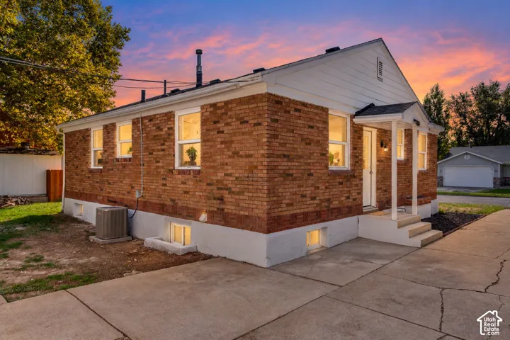 Brick exterior with white siding accents