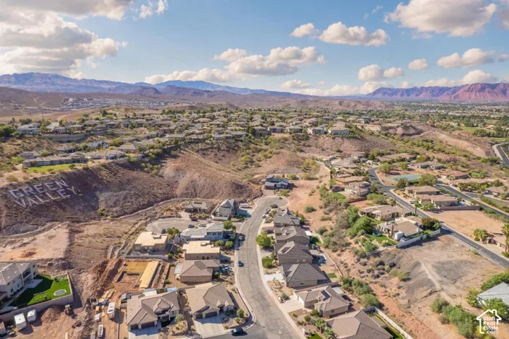 Expansive neighborhood with diverse residential architecture and curved roadways