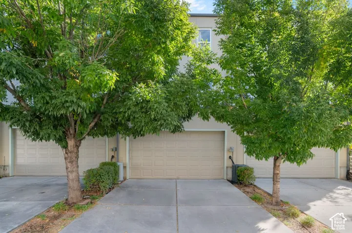 Attached two-car garage with sectional doors