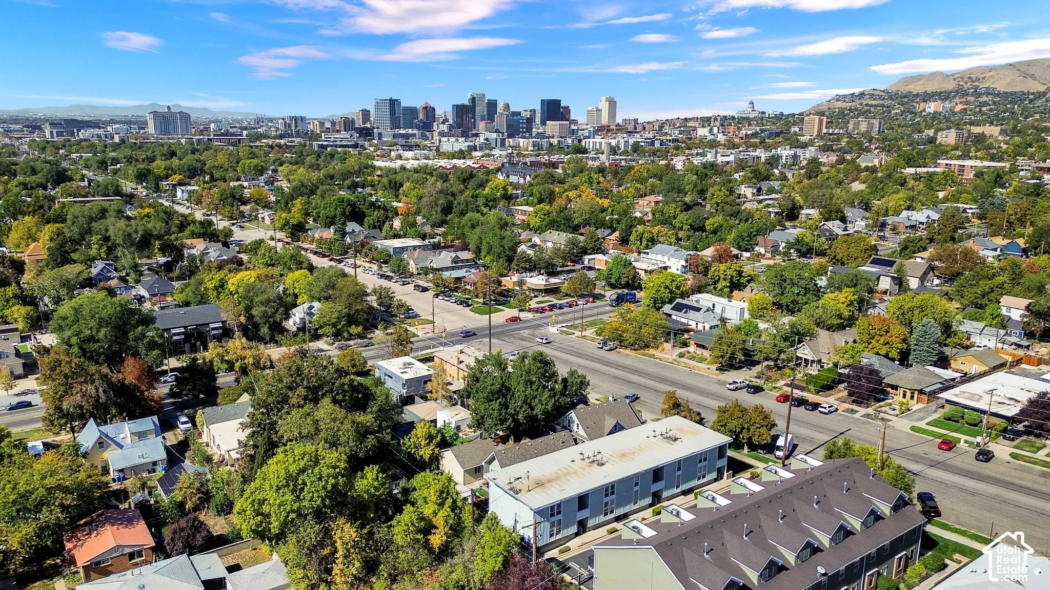 Urban skyline backdrop with a mountainous landscape