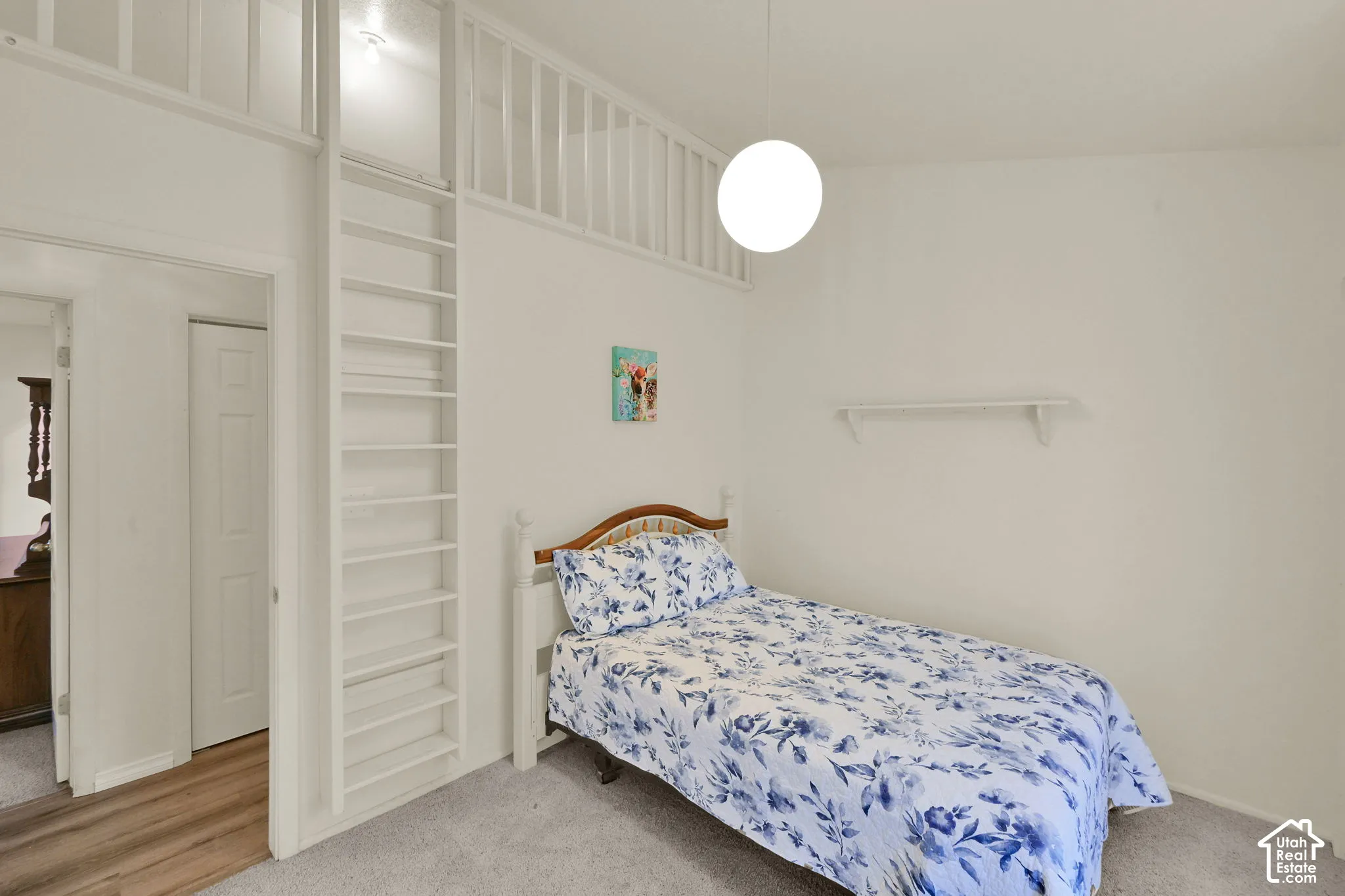 Bedroom 2. Built-in ladder providing access to an upper loft area