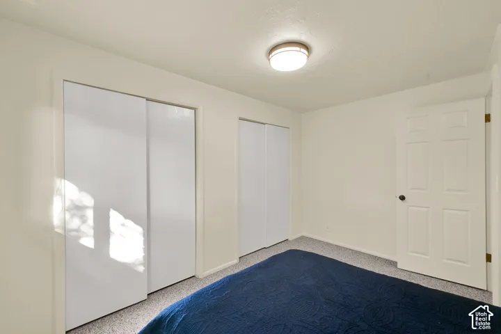 Bedroom 5. Recessed ceiling light fixture,  and carpet flooring