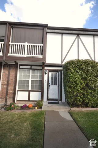 Tudor-style exterior with white and brown trim