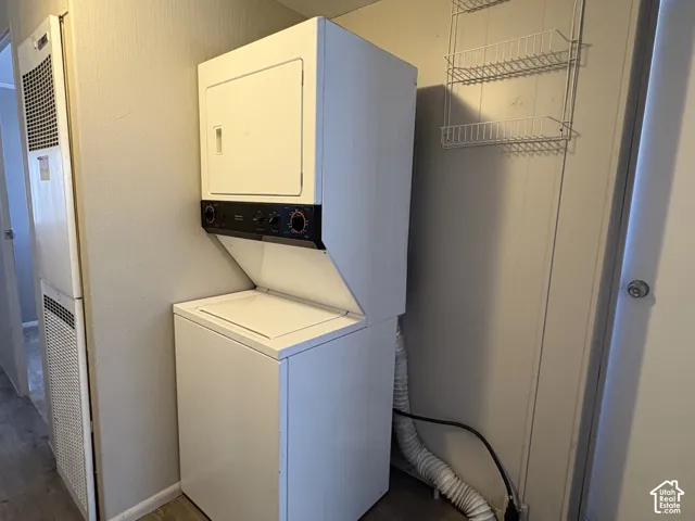 White stacked washer and dryer unit