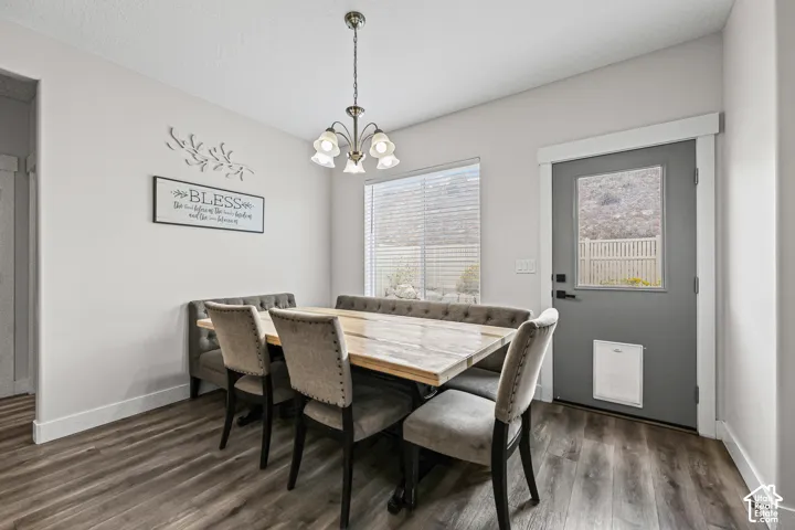 Wood-finish flooring with crisp white baseboards