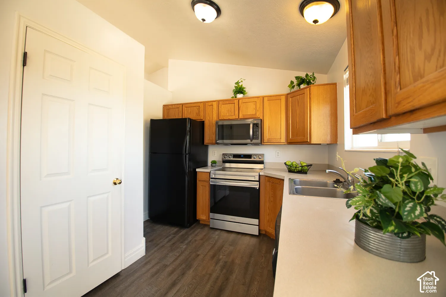 Kitchen with pantry door open