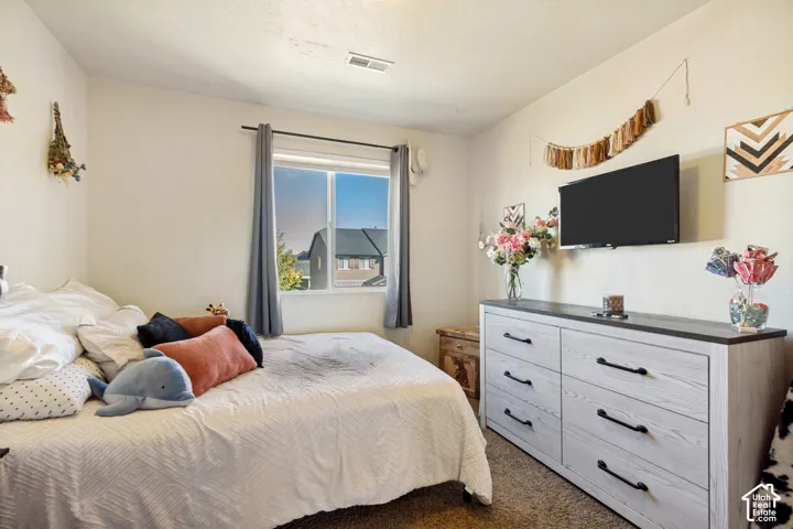White walls complement a window with a dark frame