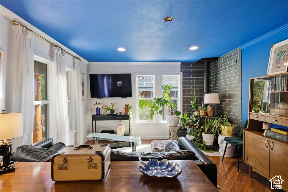 Wood-finish flooring with a blue accent ceiling