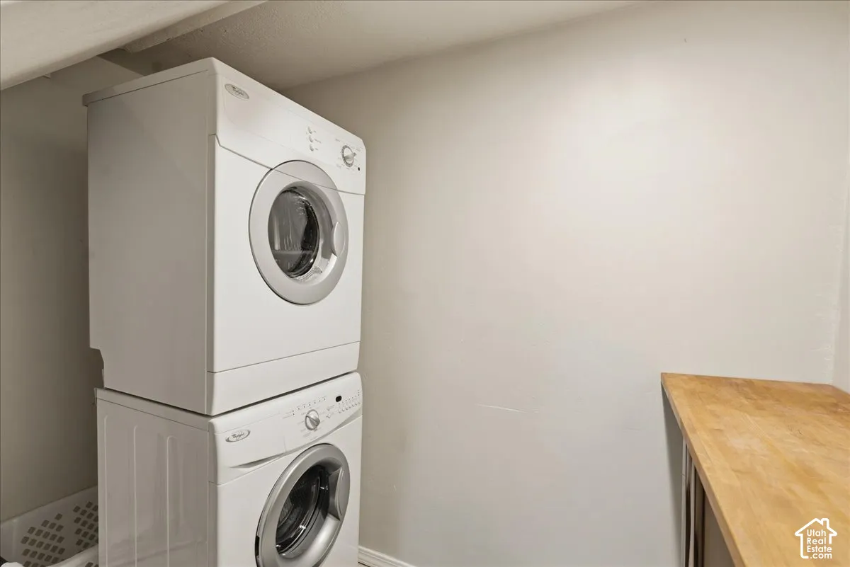 Stacked white washer and dryer units