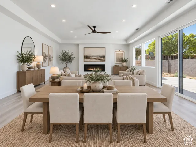 Living/Dining Rooms. Fireplace represents option that can be customized from Builders Design Center. Home is virtually staged