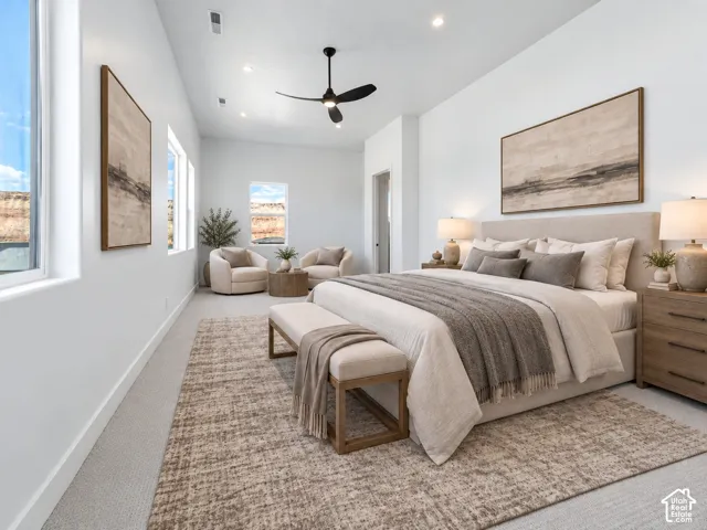 Spacious Primary Bedroom with room for seating area. virtually staged