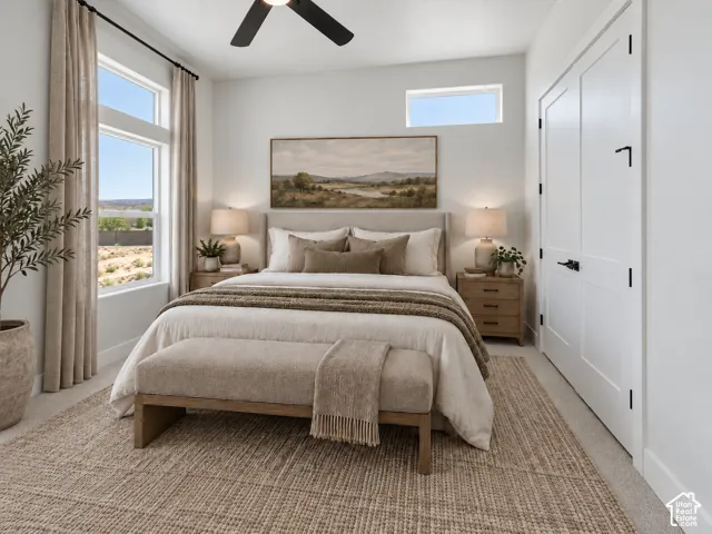 Tall windows, transom window, flush-panel doors, ceiling fan, and carpeted flooring. Home is virtually staged.