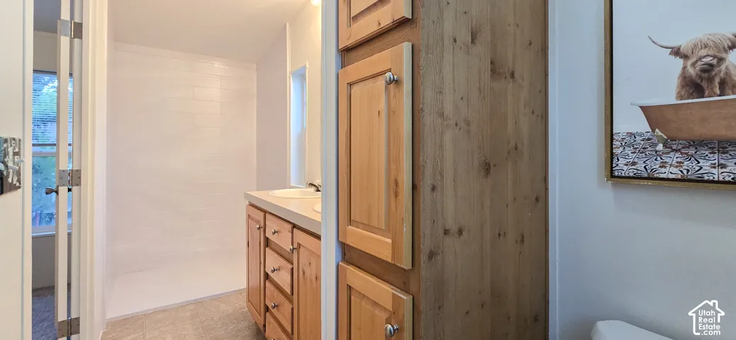 Built-in storage cabinet with natural wood finish