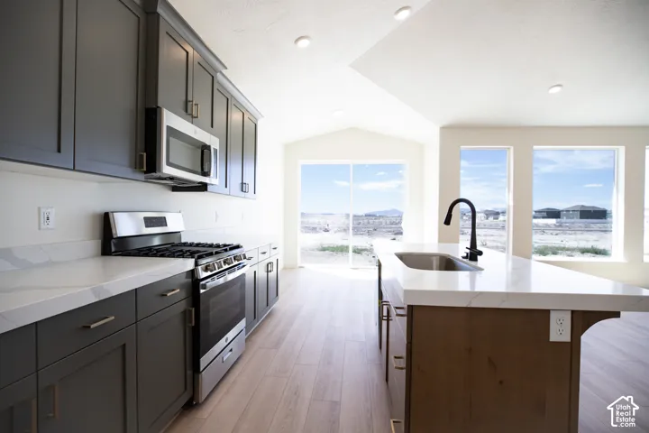 Open dining area with 8' sliding glass door adjacent to kitchen.