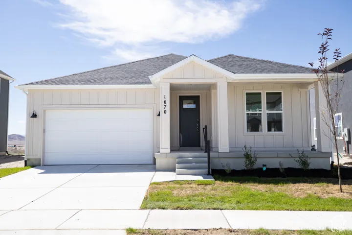 Granite Elevation A with extended front porch and front yard landscaping installed.
