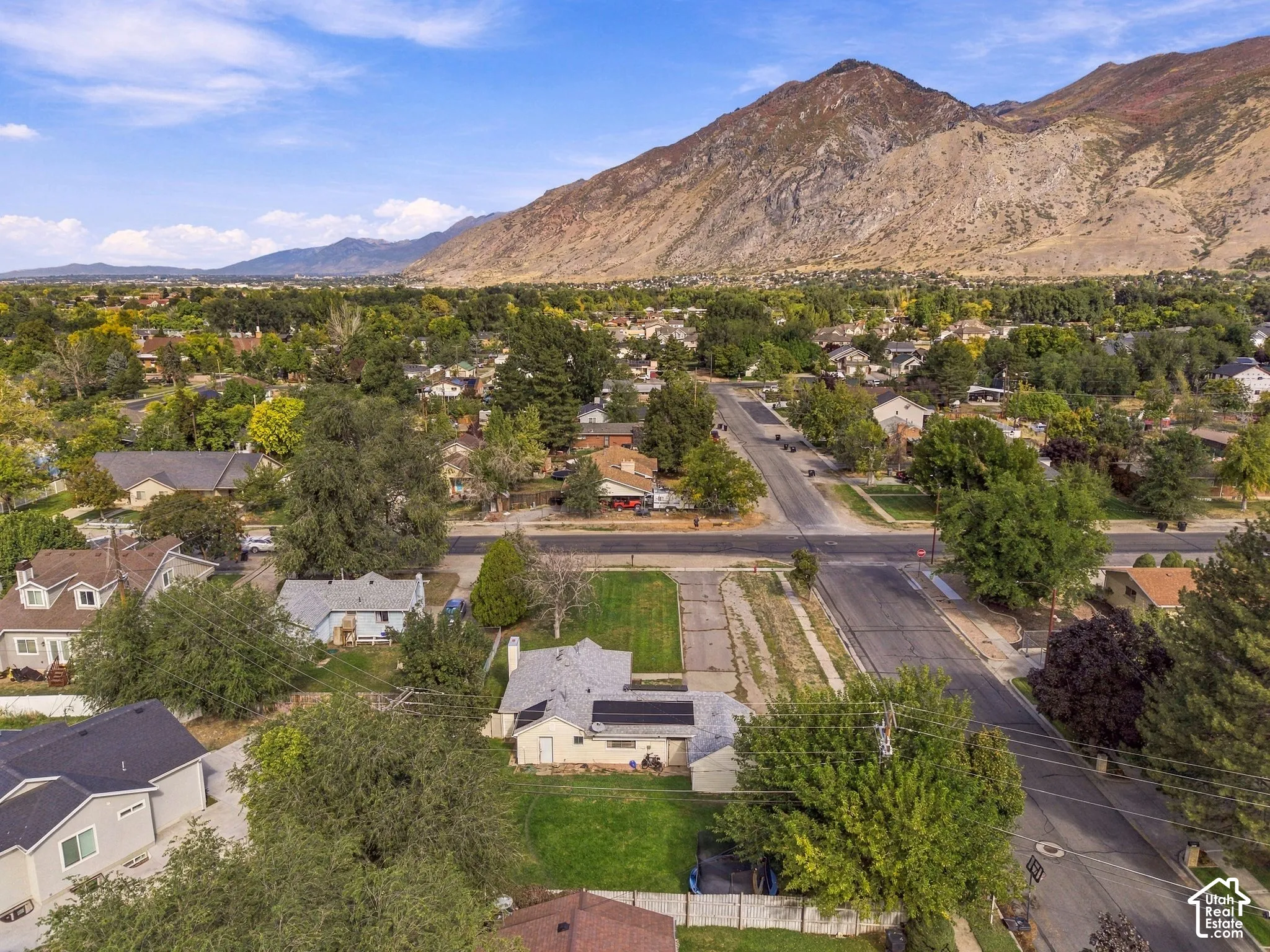 Residential neighborhood setting with a prominent mountain backdrop