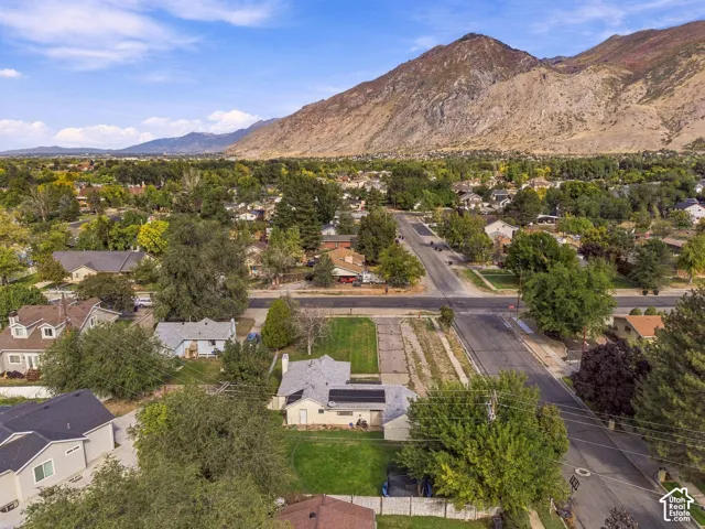 Residential neighborhood setting with a prominent mountain backdrop