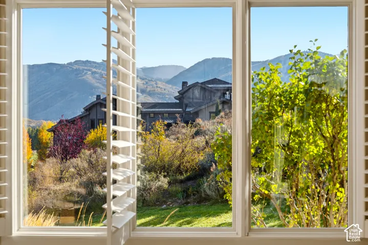 White plantation shutters complement window frames