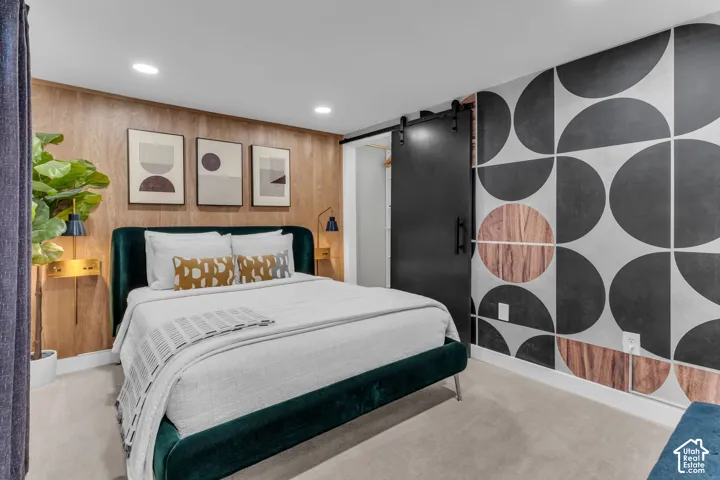 Wood-finish accent wall with integrated sconce lighting