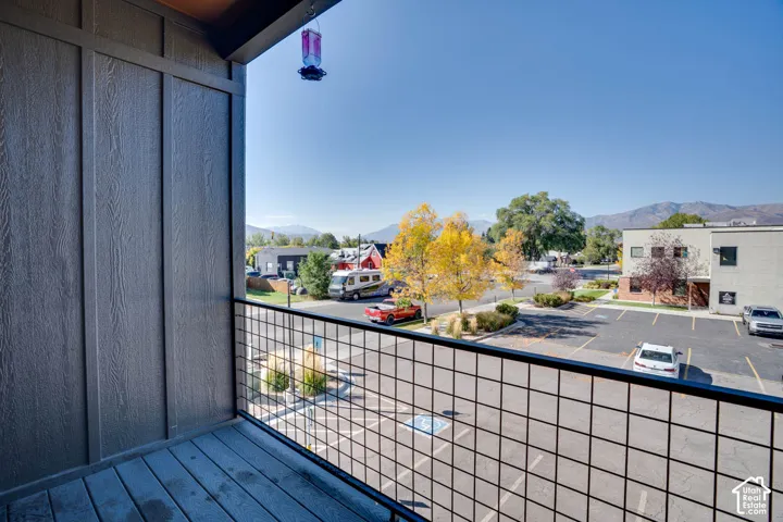 Balcony with composite decking and metal grid railing