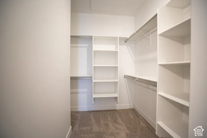 Large walk-in closet as part of primary suite.