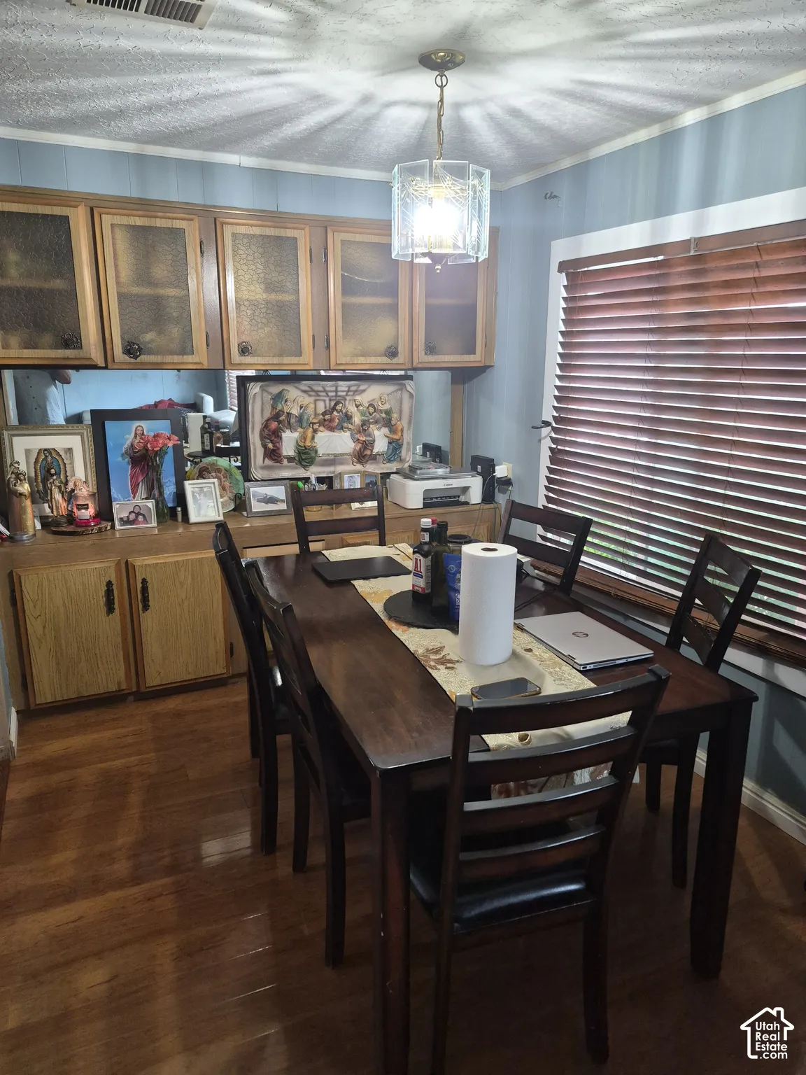 Wood-finish flooring with a rectangular dining table
