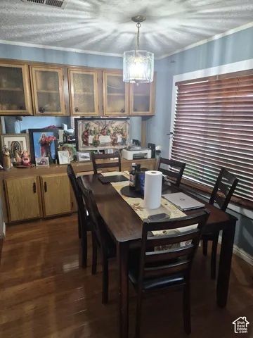 Wood-finish flooring with a rectangular dining table