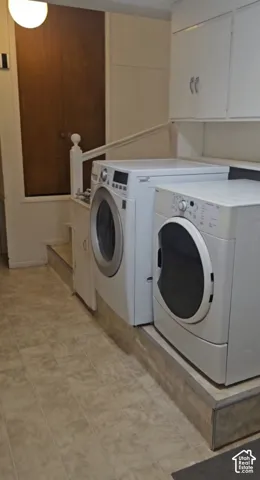 Built-in cabinetry, vinyl flooring, and permanent shelving