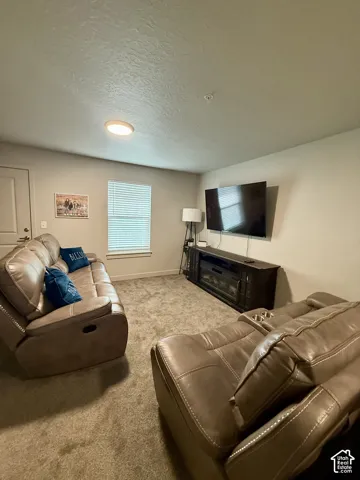 Neutral-toned wall paint with a window featuring horizontal blinds
