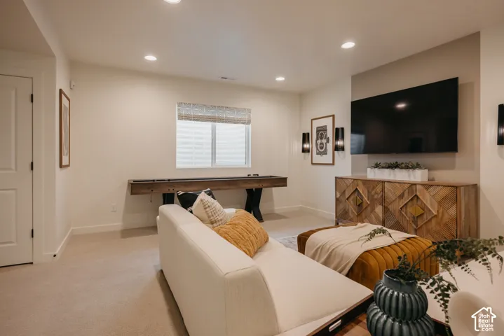 Recessed lighting illuminates a neutral color palette