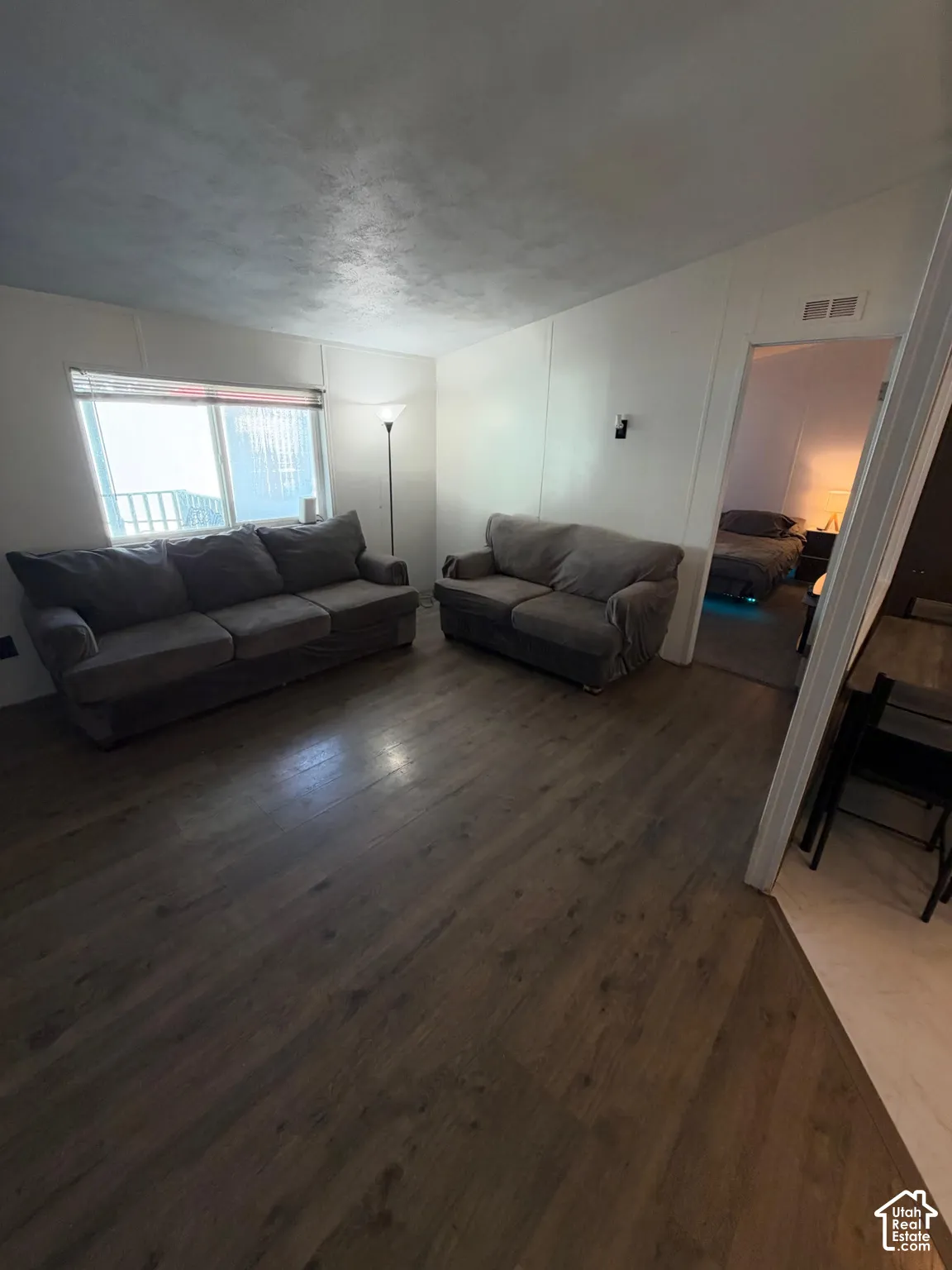 Wood-finish flooring throughout the main living area