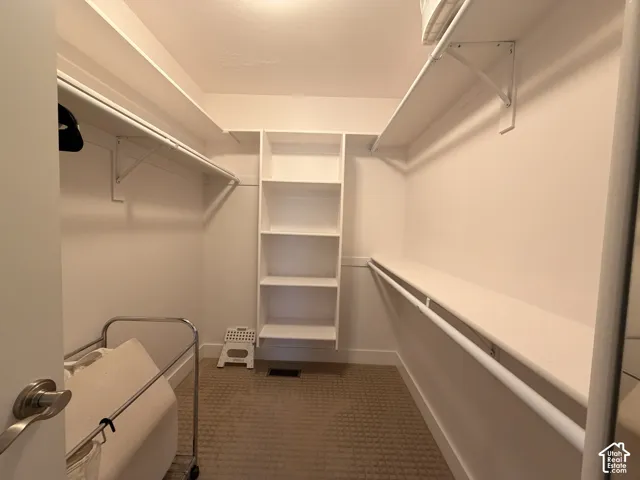 Primary bedroom's expansive walk-in closet.
