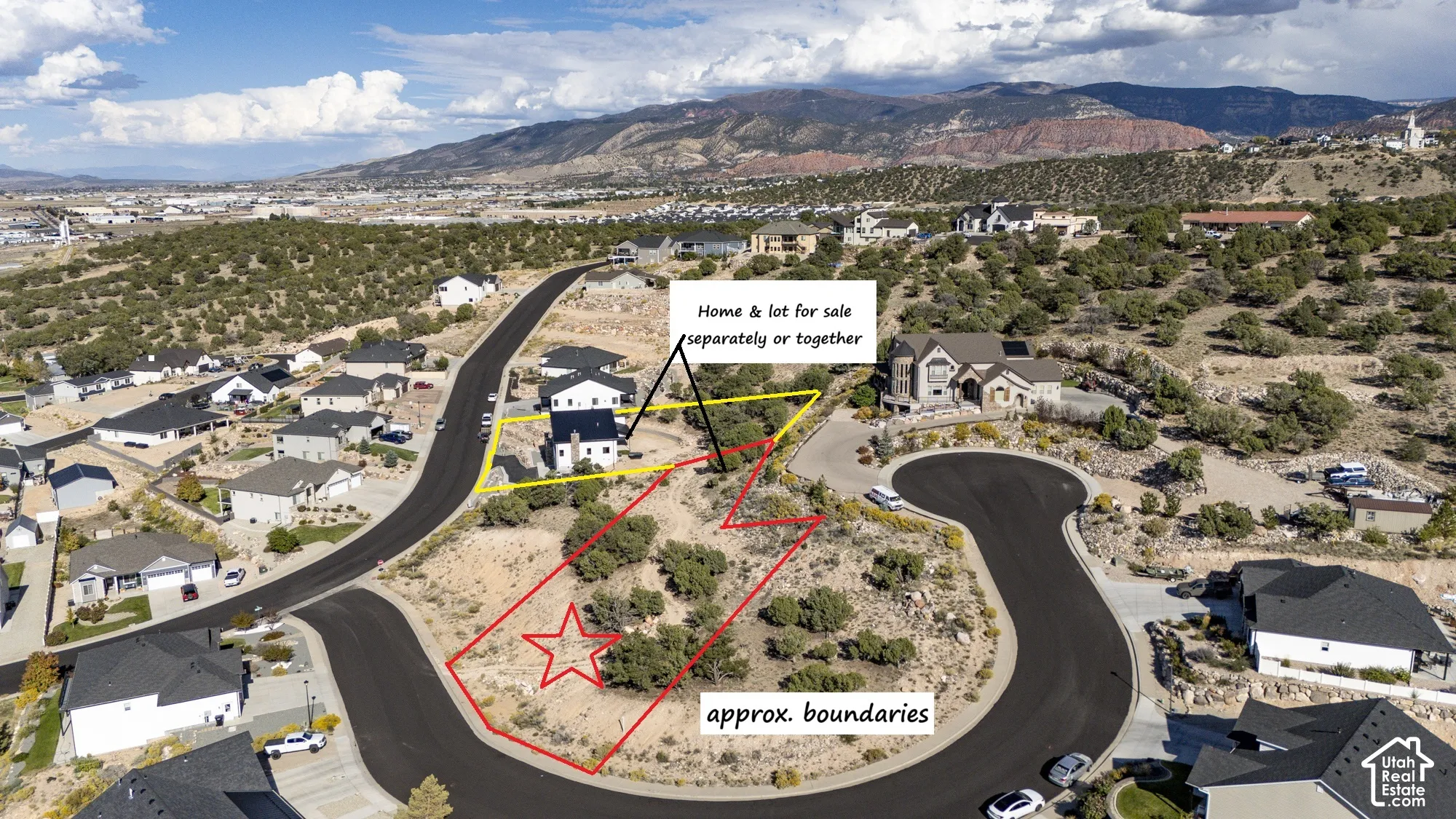 Aerial perspective of a multi-parcel lot featuring natural desert landscaping and mountain backdrops